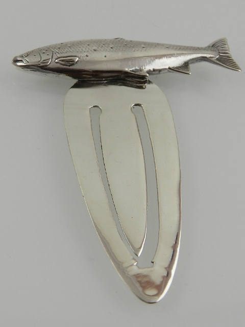 A novelty white metal bookmark, mounted with a fish, stamped 925.