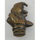 A novelty brass vesta case in the form of Mr Punch.