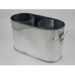 A twin-handled silver plated double wine cooler.