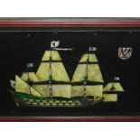 An oil painting of a ship at sea, signed. H: 49cm W: 78cm