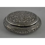 A 19th century engraved Persian silver snuff box of oval form c.1890, 8 x 6.