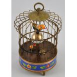 A Victorian style bird cage automaton time piece