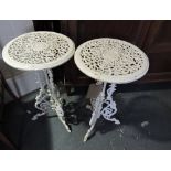 A pair of Victorian style pierced cast metal tripod plant stand,