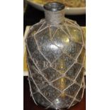 A pair of lustrous bottles with roped webbing,