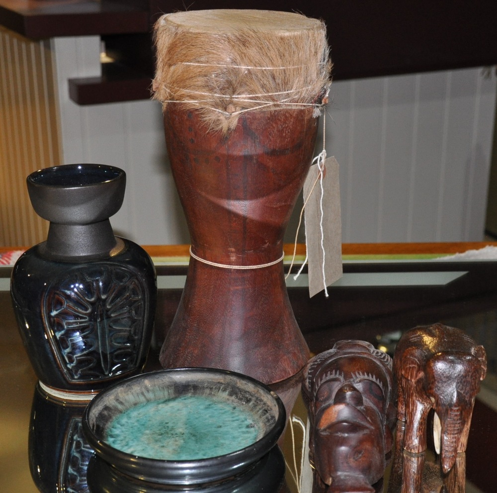 A small quantity of assorted West African hardwood carvings, a Medina style glass ash tray,