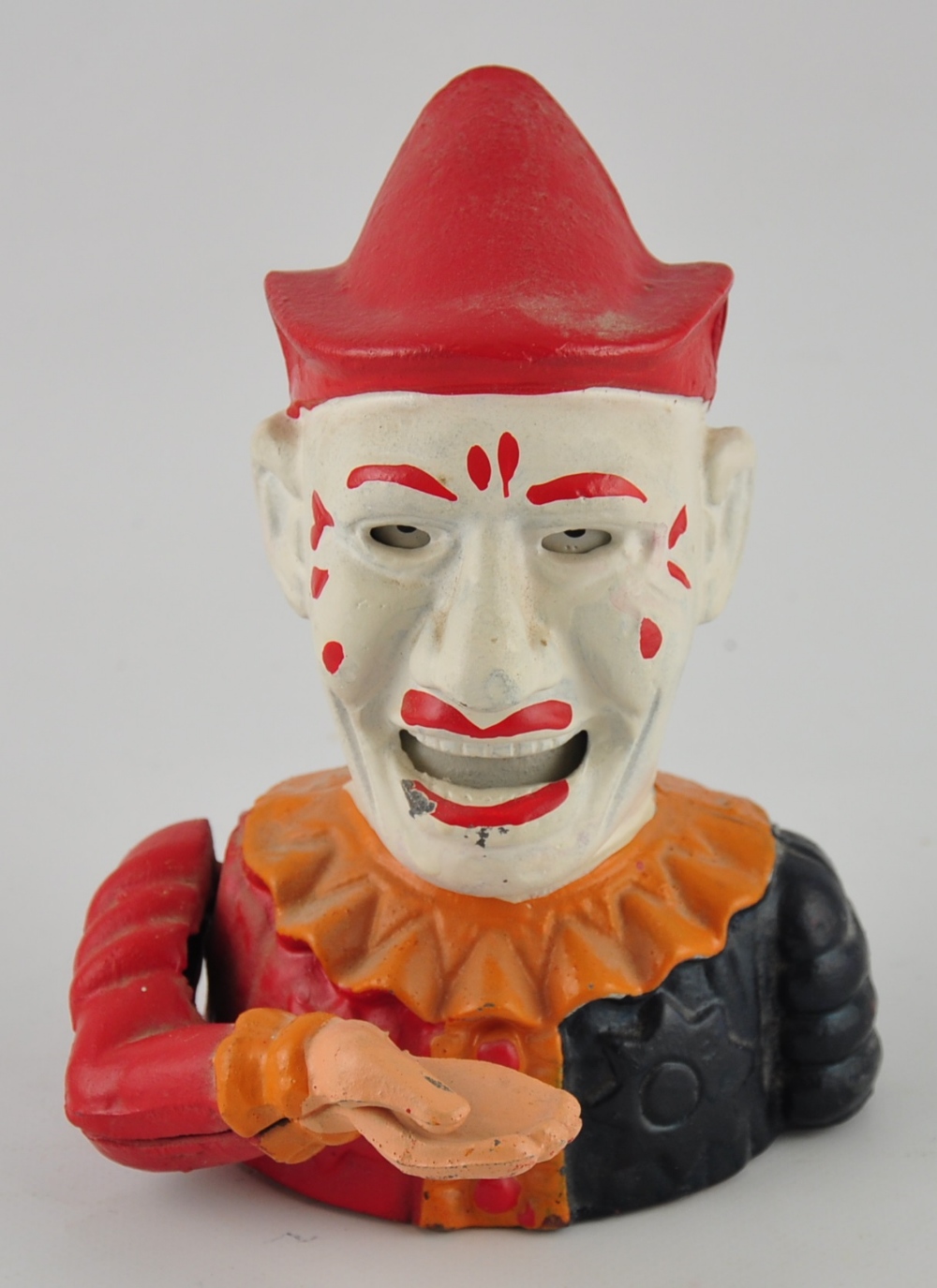 A Victorian cast iron articulated money box modelled as a clown, later repainted, H.