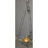 A brass and wrought iron hanging oil lamp, drop 100cm,