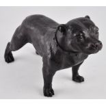 A dark patinated bronze of a standing bulldog,