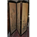 An Edwardian mahogany three fold dressing screen inset floral woolwork panels,