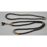 A Chinese agate coloured necklace together with a grey pearl necklace