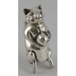 A sterling silver novelty vesta modelled as a standing pig with a money bag