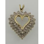 An 18 carat yellow gold and diamond set heart-shaped pendant, the stones of approx. 2.0 carats