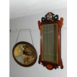 A George III style mahogany fretwork wall mirror, the surmount incorporating a ho-ho bird above a