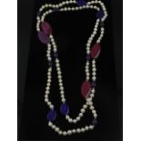 An opera length pearl and multi-coloured agate necklace.