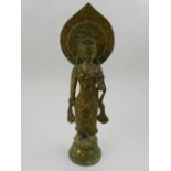 A cast gilt bronze study of a Hindu deity, raised on lotus base. H: 25cm