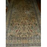 A cream ground woolen silk Qom carpet,