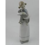 A Lladro porcelain figurine, 'Girl with Lamb' no.4505.