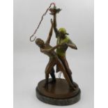 An Art Deco style spelter table lamp, modelled in the form of dancing gypsy's,
