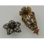 A late 19th / early 20th century white metal and diamond set flower, possibly from a brooch,