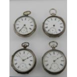 A selection of four silver open faced pocket watches, all with subsidiary seconds dials,