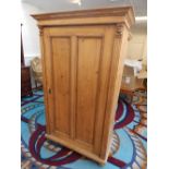 A 19th century pine wardrobe,