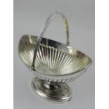 A George III silver basket, London 1775, bears makers mark of Peter Podio,