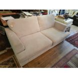 A contemporary mink two seater upholstered sofa, W.