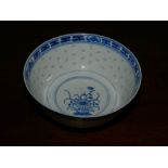 A Chinese blue and white porcelain tea bowl, the centre decorated with floral design,