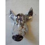 A chrome plated pigs head wall trophy,