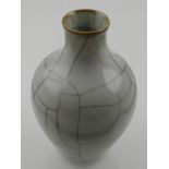 A Chinese miniature crackle glaze baluster vase. H.