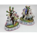 A pair of Continental porcelain figural groups, each having a gallant and maiden beside a tree,