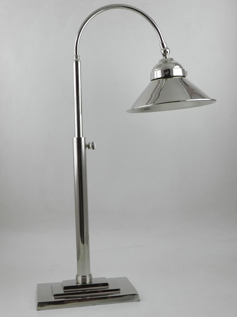 A silver plated Art Deco style adjustable desk lamp.