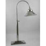 A silver plated Art Deco style adjustable desk lamp.