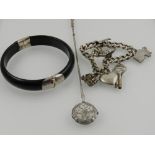 A silver charm bracelet, hallmarked London and A.G.