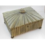 An mid 19th century Indian buffalo horn work box of rectangular reeded form, the arched cover with