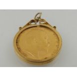 An Edward VIII gold sovereign, 1903, set in a 9 carat yellow gold mount pendant.