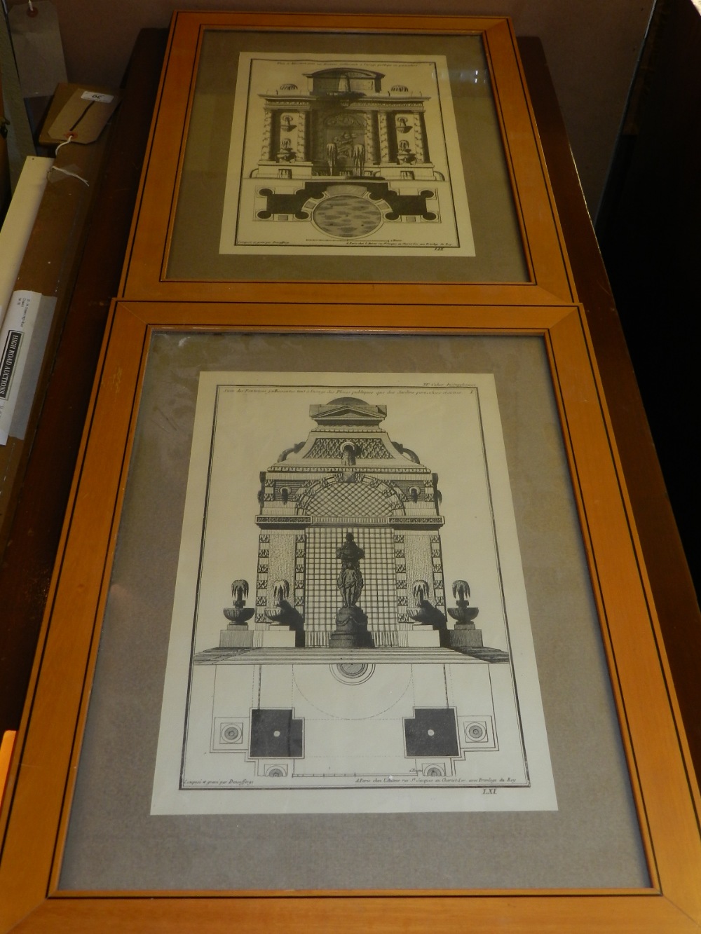 Two 19th century French prints depicting architectural studies. H. 38cm W.