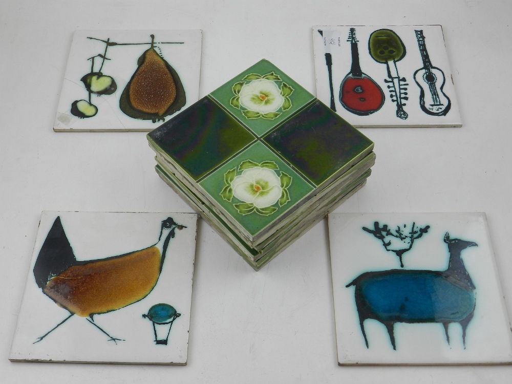 A set of four glazed tiles decorated with Ann Wynn Reeves, H: 15cm W: 15cm,