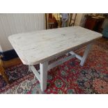 An 18th century style rectangular side table with distressed paint finish,