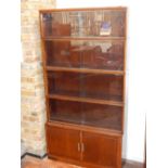 A 1950's Minty five section glazed walnut bookcase, W.