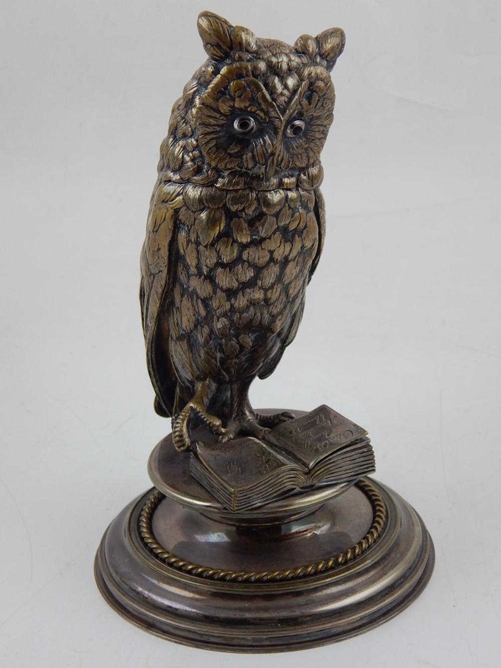 A late Victorian silver plated inkstand modelled as an owl,