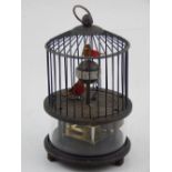 A Chinese novelty clock in the form of a bird cage. H.