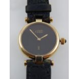 A gold plated Must de Cartier Vendome ladies wristwatch, black dial, no.