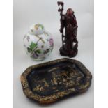 A Chinese papier mâché tray, rounded rectangular depicting figures in a landscape (AF),