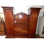 An early Victorian mahogany wardrobe,