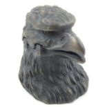 A vintage style inkwell modelled in the form of an eagles head, H. 8cm.