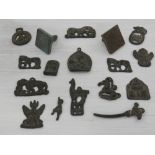 A collection of bronze items, to include mounts, seals and artifacts.
