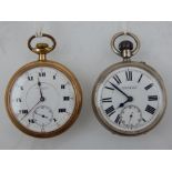 A white metal open faced Campaign pocket watch, the enamel dial with Roman numerals,