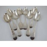 A collection of eight late 18th/ 19th century silver tablespoons, Old English and fiddle pattern,