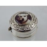 A novelty circular white metal tape measure,